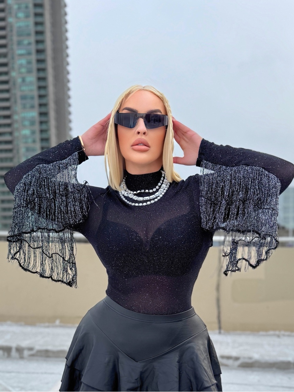 SHEIN fringe long sleeve mesh body suit with fringe details.